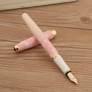 Pluma estilográfica rosa y blanca con flores de cerezo y detalles dorados