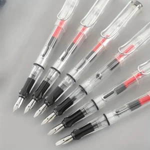Seis plumas de caligrafía de punta plana con cuerpo transparente